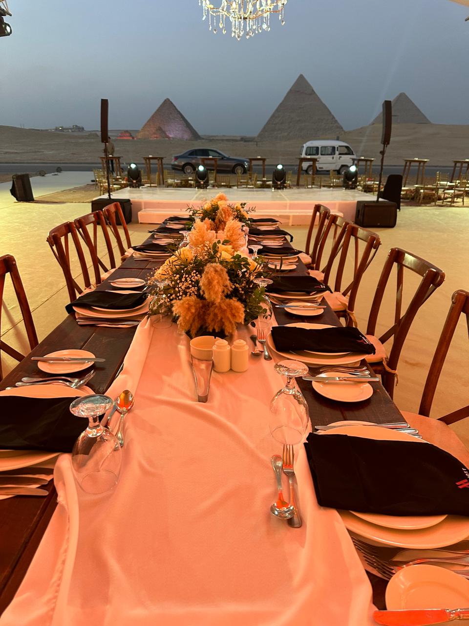 Gala dinner with pyramid backdrop