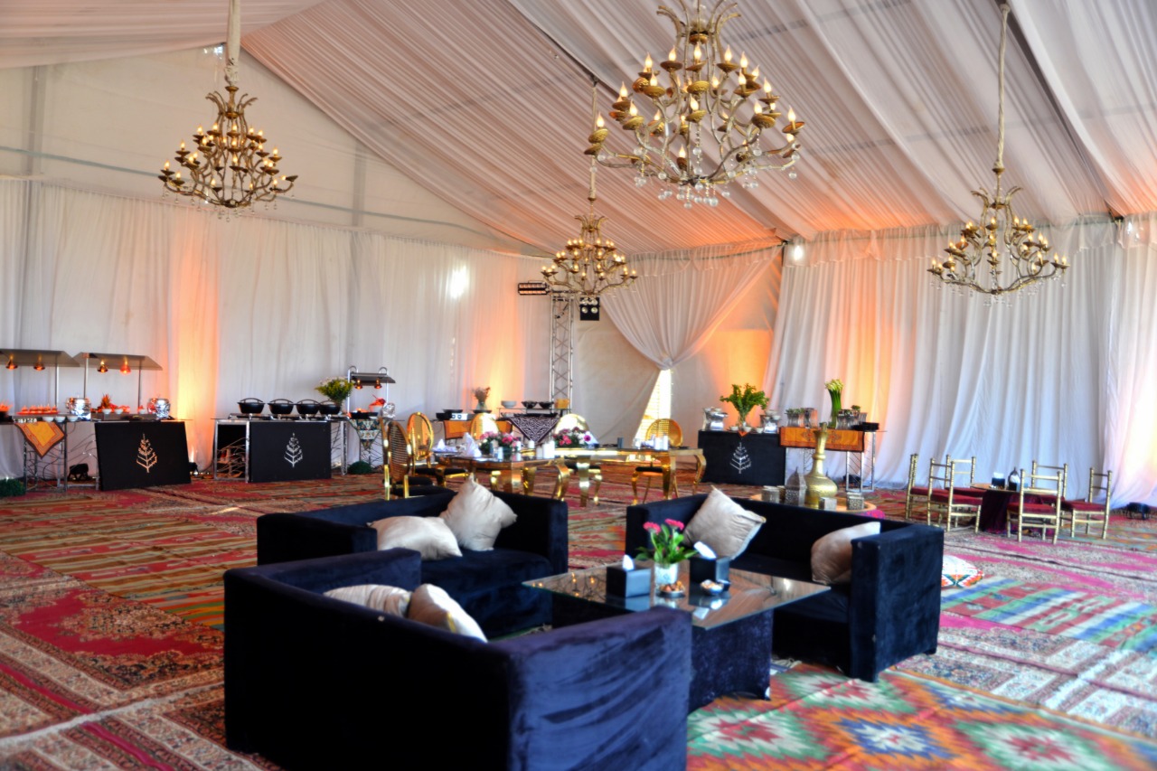 Luxury event tent interior with chandeliers