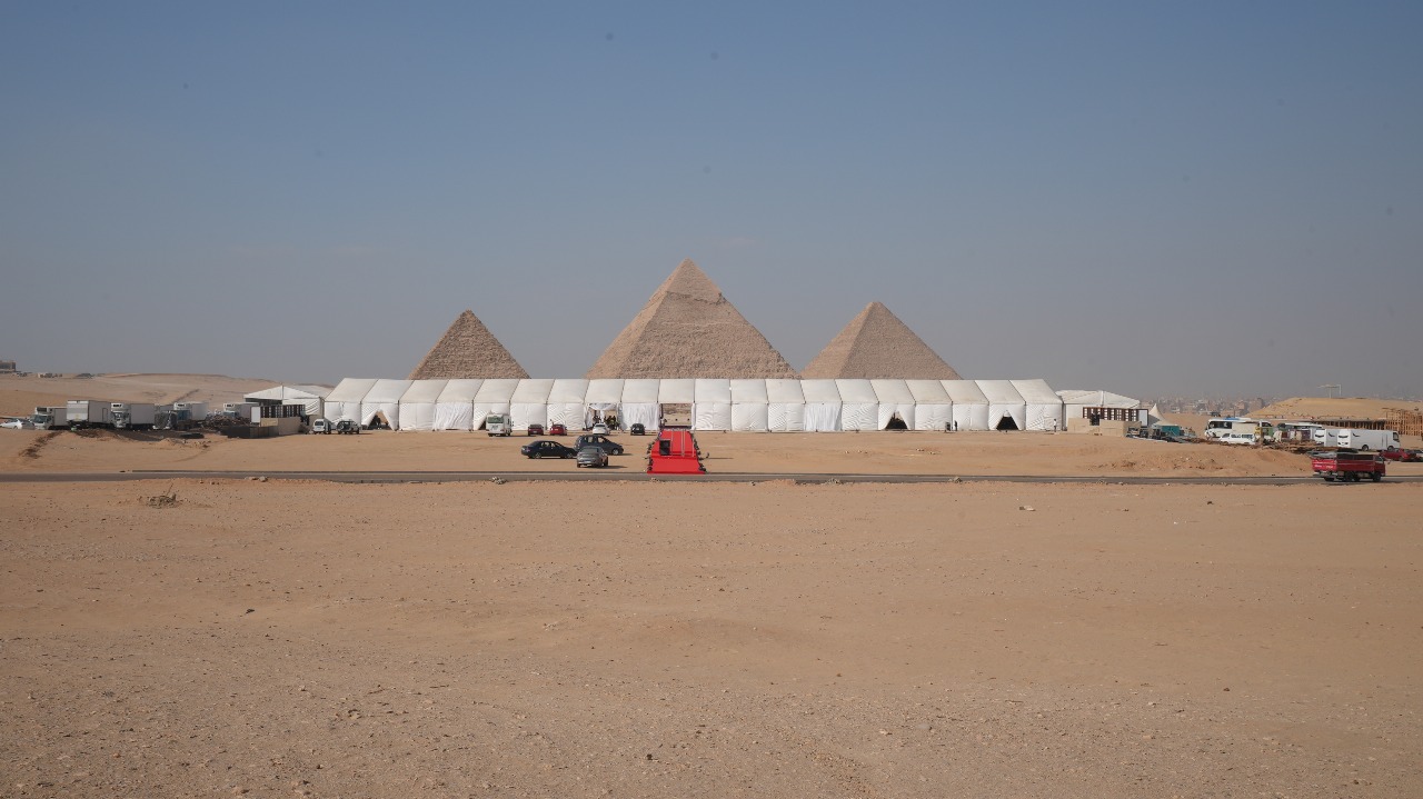 Event marquees before the Pyramids