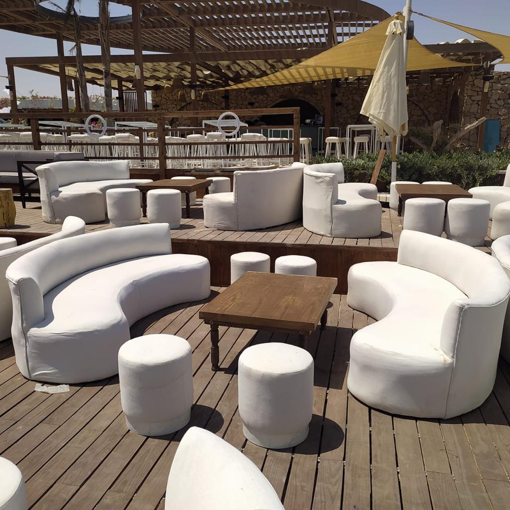 Open-air lounge under a pergola